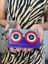 Billetera Purple Monster Eyes Pochette