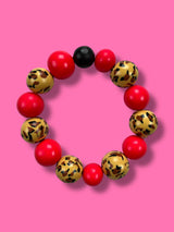 Pulsera Esferas Animal Print Fucsia