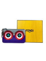 Billetera Purple Monster Eyes Pochette